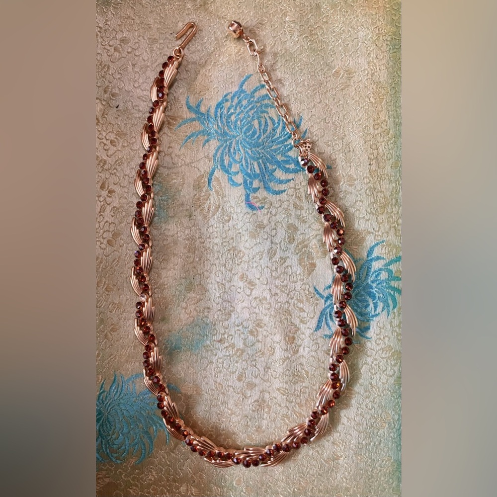 Vintage Crown Trifari Necklace: Gold Tone Swirls with Red Rhinestones